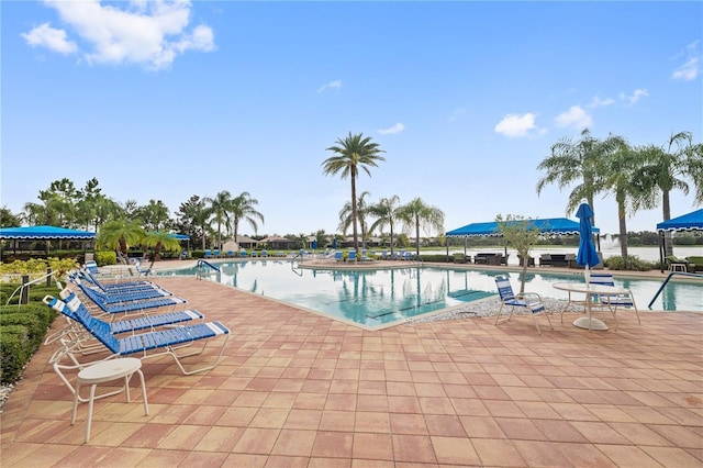 view of swimming pool featuring a patio area