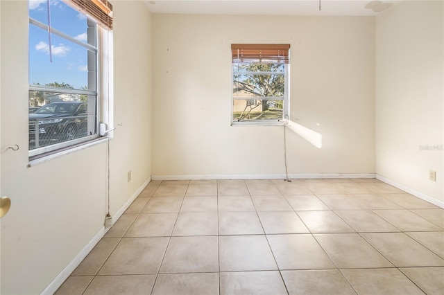 view of tiled spare room