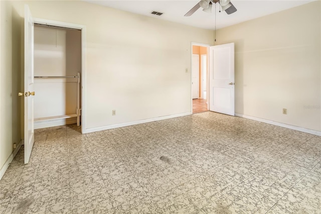 unfurnished bedroom featuring a closet and ceiling fan