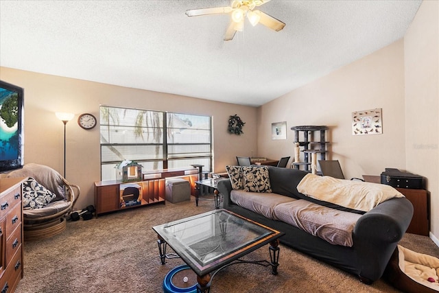 carpeted living room with ceiling fan, lofted ceiling, and a textured ceiling