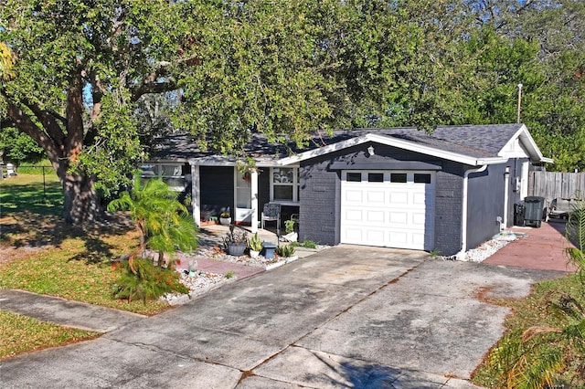 ranch-style home with a garage