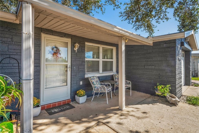 doorway to property with a porch