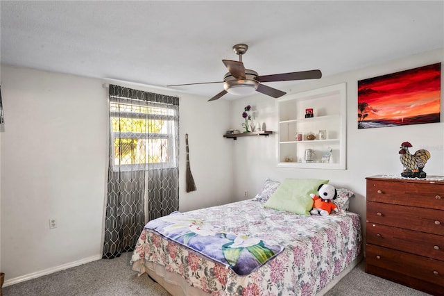 bedroom with ceiling fan and carpet