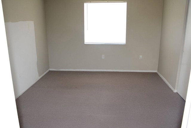 empty room with carpet floors