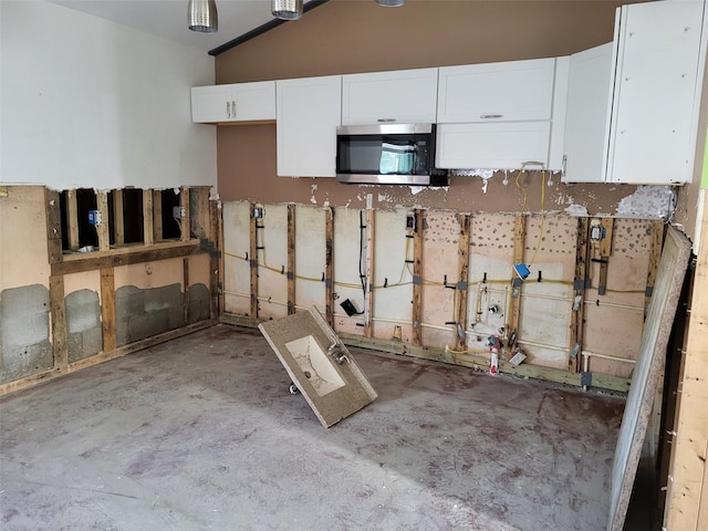 interior space featuring white cabinetry