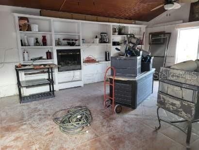 storage area with ceiling fan