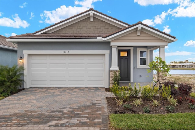 view of front of home with a garage