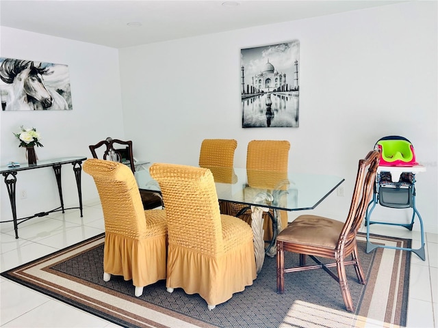 dining room with tile patterned floors