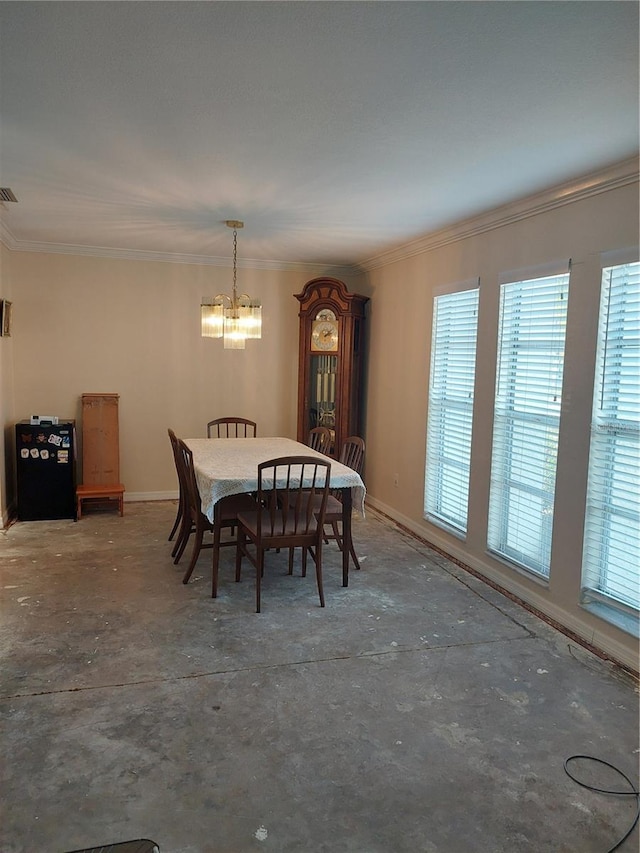 dining room with an inviting chandelier and ornamental molding