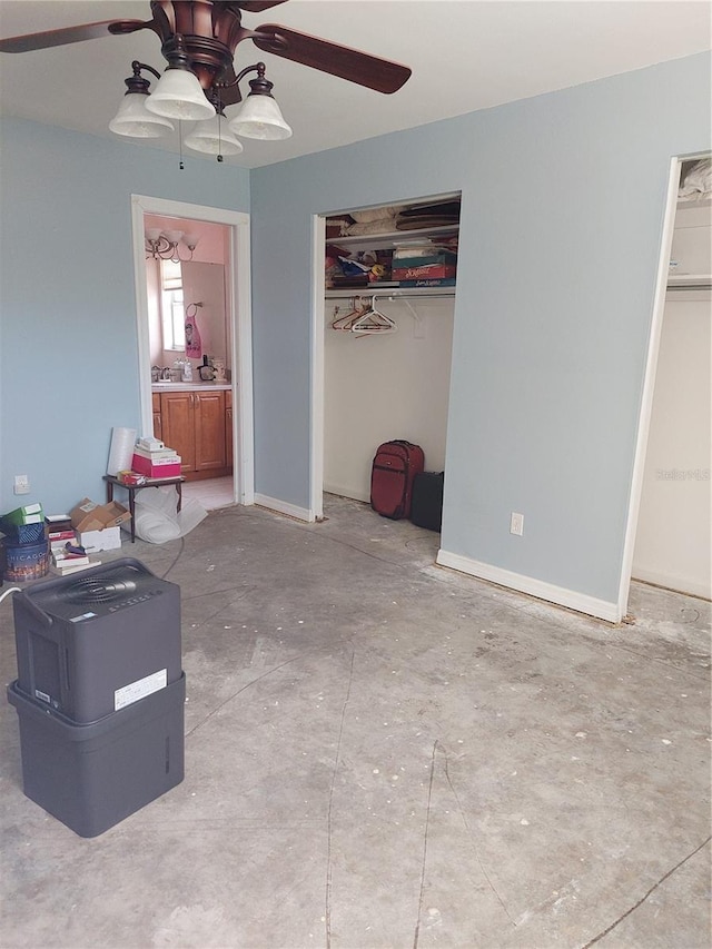 bedroom with ceiling fan and a closet