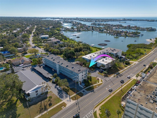 birds eye view of property featuring a water view