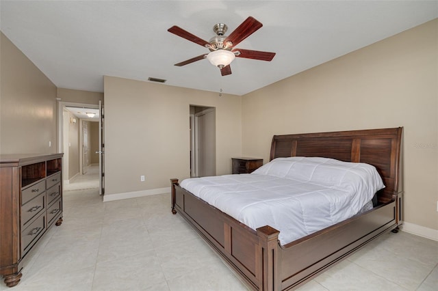 tiled bedroom featuring ceiling fan