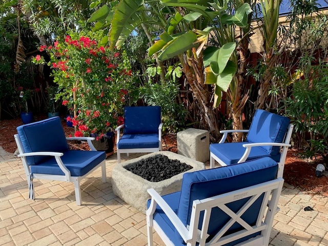 view of patio / terrace with a fire pit