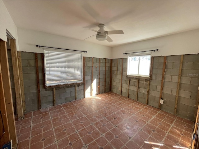 empty room featuring ceiling fan