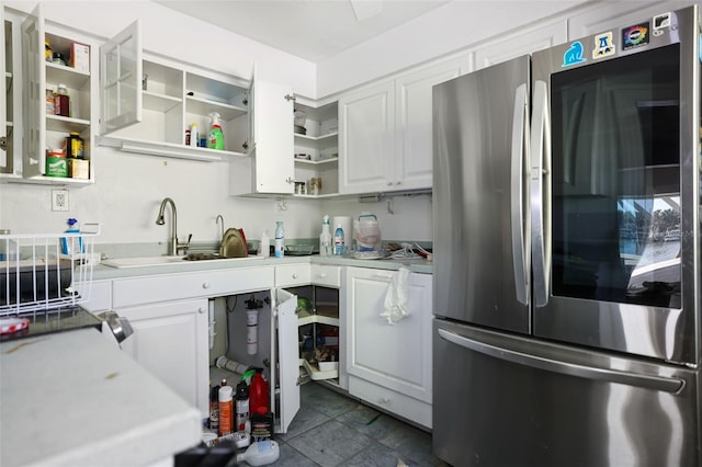 353 144th Ave, Madeira Beach, FL 33708 - kitchen with smart refrigerator, open shelves, a sink, white cabinetry, and light countertops