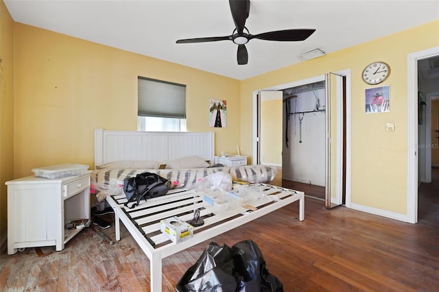 353 144th Ave, Madeira Beach, FL 33708 - bedroom with a closet, ceiling fan, wood finished floors, and baseboards