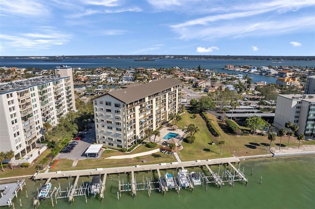 birds eye view of property featuring a water view