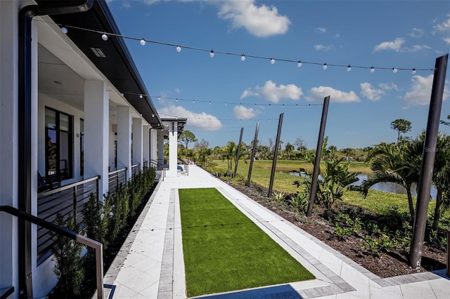 view of yard with a water view