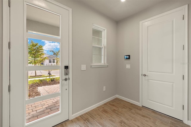 entryway with light wood-type flooring