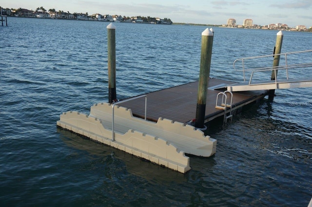 view of dock with a water view