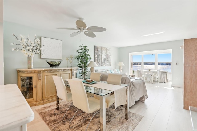 dining room with ceiling fan