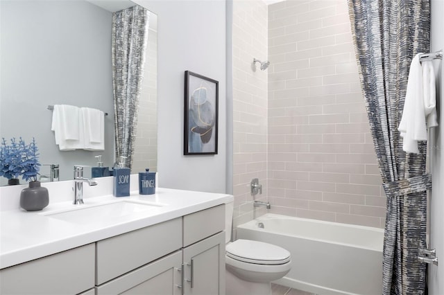 full bathroom with vanity, toilet, and shower / tub combo with curtain