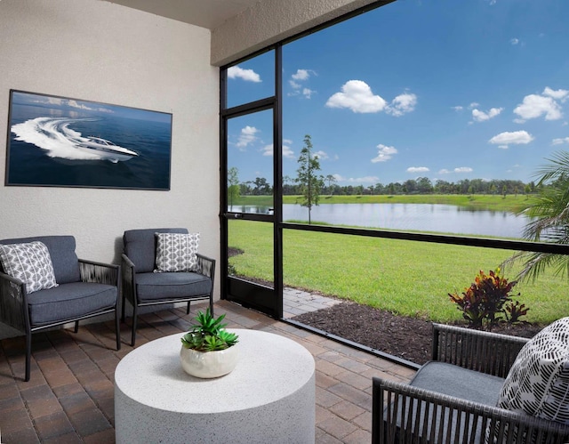 sunroom with a water view