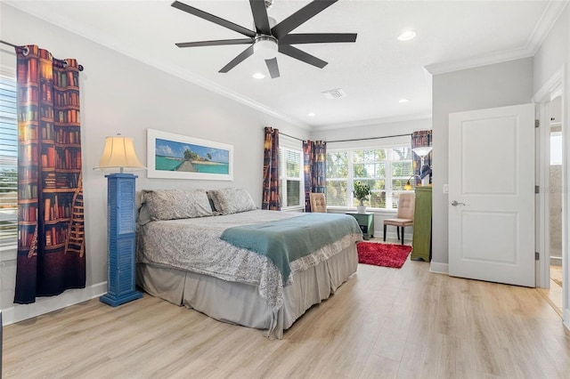 bedroom featuring ceiling fan, light wood-type flooring, and ornamental molding