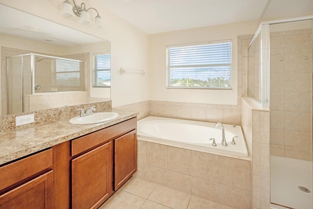 bathroom featuring vanity, tile patterned floors, and independent shower and bath