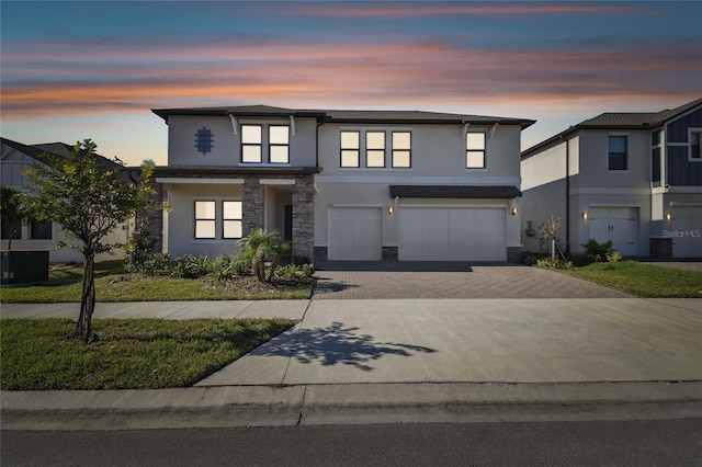 view of front of property featuring a garage