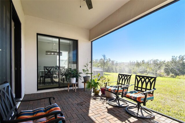 view of patio with ceiling fan