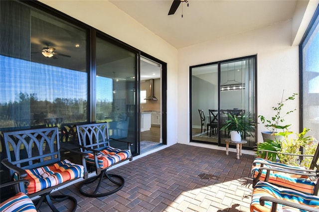 view of patio / terrace featuring ceiling fan