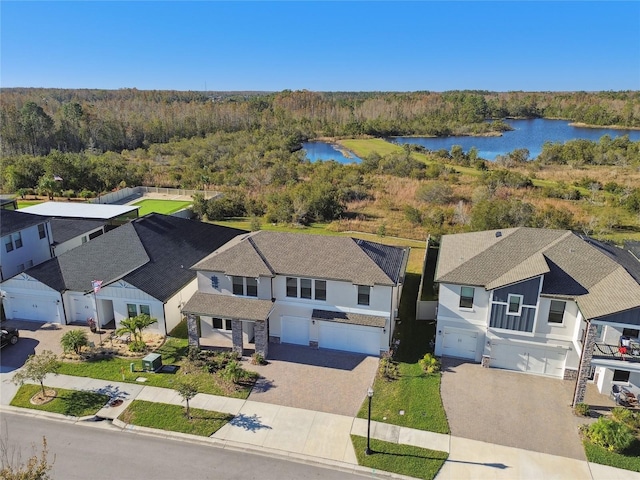 21291 Snowy Orchid Ter, Land O Lakes, FL 34637 - aerial view of residential area featuring a heavily wooded area and a large body of water