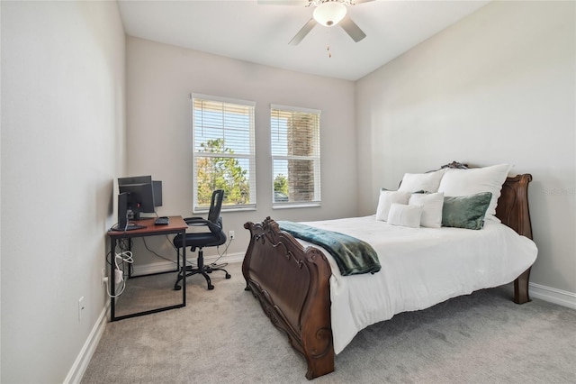 21291 Snowy Orchid Ter, Land O Lakes, FL 34637 - bedroom with light carpet, baseboards, a desk, and ceiling fan