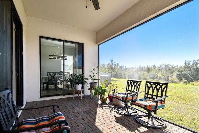 21291 Snowy Orchid Ter, Land O Lakes, FL 34637 - view of patio / terrace featuring view of wooded area