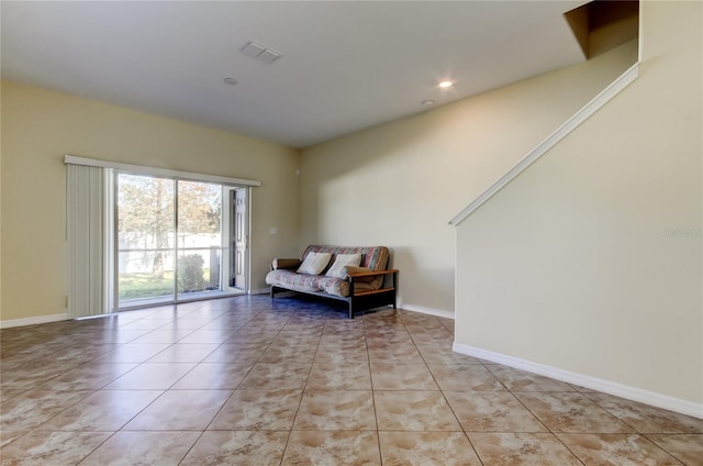 living area with light tile patterned floors