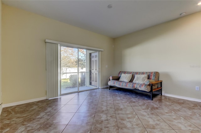 sitting room featuring light tile patterned floors