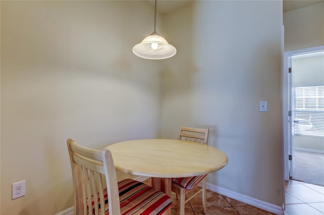 view of tiled dining space