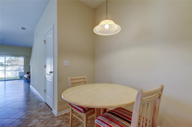 dining area with tile patterned floors