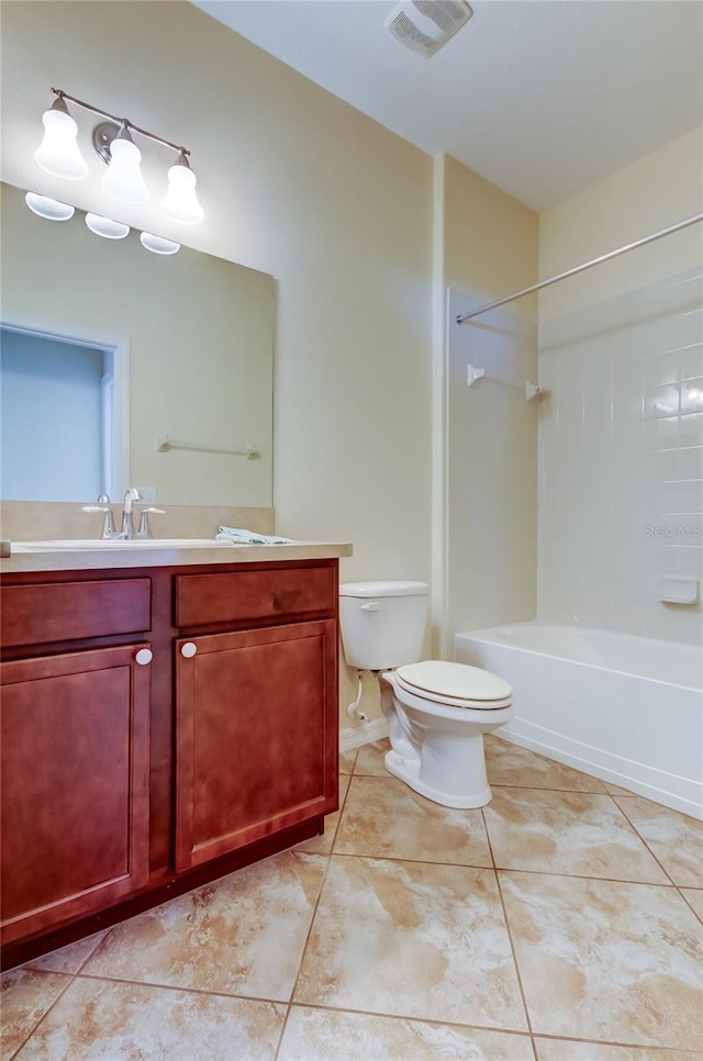 full bathroom with tile patterned floors, vanity, toilet, and tub / shower combination