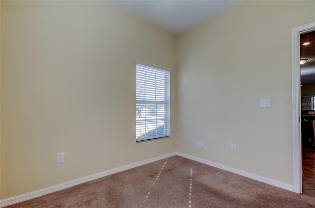 view of carpeted spare room