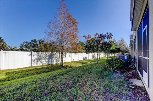 view of yard featuring central AC