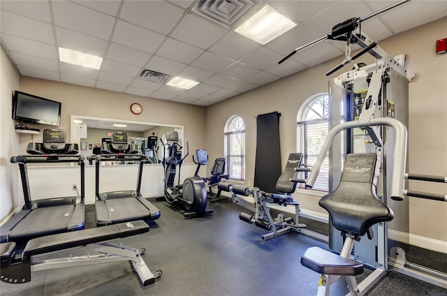 gym with a drop ceiling