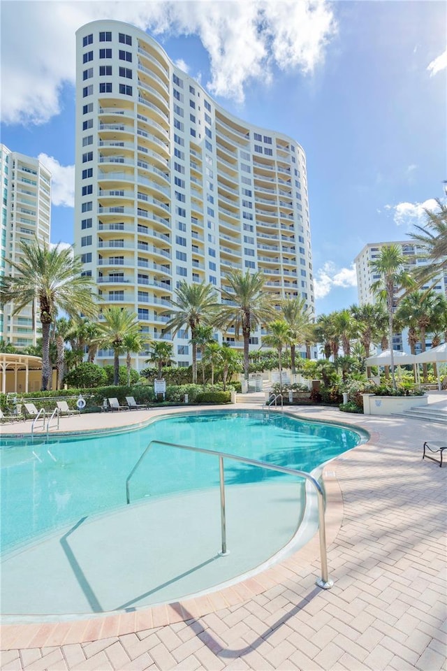 view of swimming pool featuring a patio area