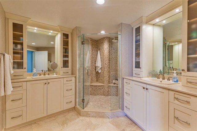 bathroom featuring vanity and walk in shower