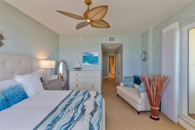 carpeted bedroom with ceiling fan