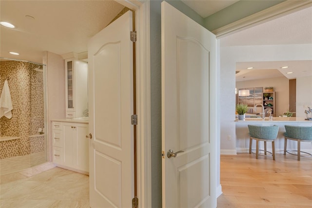 hallway with light wood-type flooring