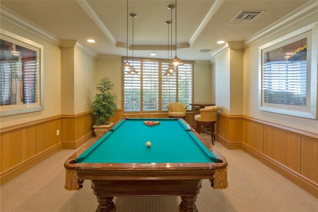 recreation room with a tray ceiling, light carpet, pool table, and ornamental molding