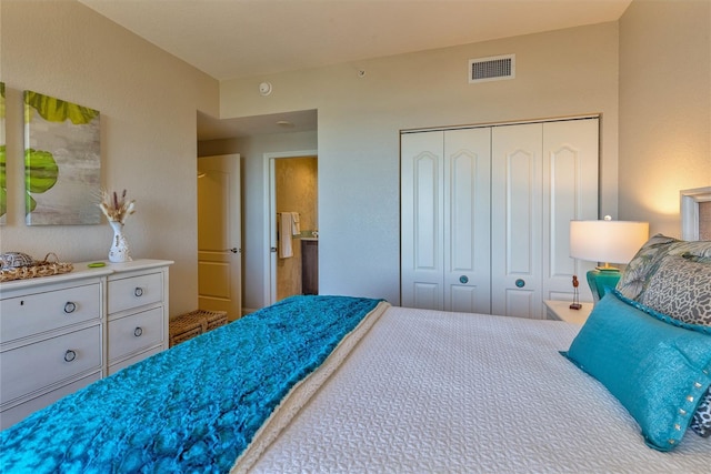 bedroom featuring carpet flooring and a closet