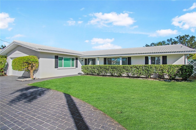 ranch-style home with a front yard